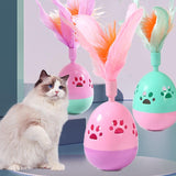PetHaven.comTumbler Bell Cat Interactive ToysTumbler Bell Cat Interactive ToysProduct information:
 
 Color: pink, purple, green
 
 Material: Plastic
 
 Category: Pet Toys
 
 Name: hollow footprints with feathers Tumbler
 
 Material: ABS
 
 Co0