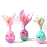 PetHaven.comTumbler Bell Cat Interactive ToysTumbler Bell Cat Interactive ToysProduct information:
 
 Color: pink, purple, green
 
 Material: Plastic
 
 Category: Pet Toys
 
 Name: hollow footprints with feathers Tumbler
 
 Material: ABS
 
 Co0