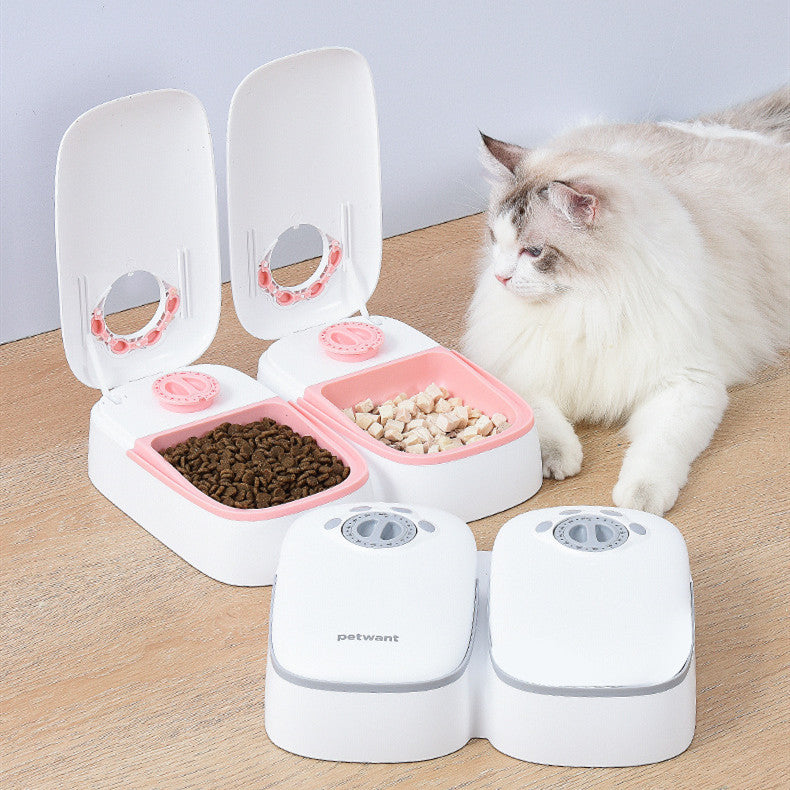 PetHaven.comPet Automatic Timing Feeder PuppyPet Automatic Timing Feeder PuppyProduct information:
 
 Material: Plastic
 
 Applicable object: Cat
 
 Specification: full double meal feeder/light gray
 
 Category: Pet tableware.
 
 Size: 242X2840