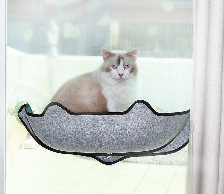 PetHaven.comWindow sill cat hammockWindow sill cat hammockSize: 59*22*13cm
 
 Material: EVA + felt cloth
 
 Product Features / Features:
 
 
 A wrapped suction cup cat hammock for winter and summer
 
 
 1. The cat litter isDog/Cat house