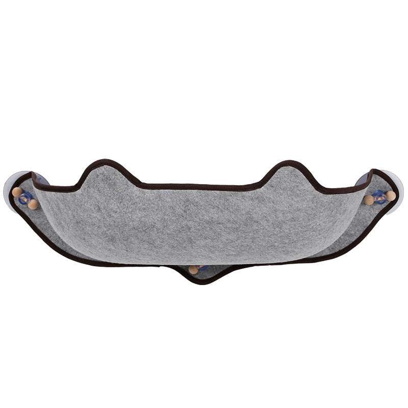 PetHaven.comWindow sill cat hammockWindow sill cat hammockSize: 59*22*13cm
 
 Material: EVA + felt cloth
 
 Product Features / Features:
 
 
 A wrapped suction cup cat hammock for winter and summer
 
 
 1. The cat litter isDog/Cat house