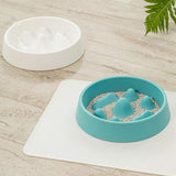 PetHaven.comPet Slow Food BowlPet Slow Food BowlMaterial: PP
 
 Color: off-white, blue
 
 Various shapes of mountains in the food plate, scientific separation design
 
 Unable to contact food in a large area at on0