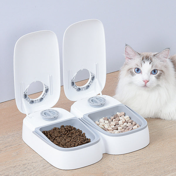PetHaven.comPet Automatic Timing Feeder PuppyPet Automatic Timing Feeder PuppyProduct information:
 
 Material: Plastic
 
 Applicable object: Cat
 
 Specification: full double meal feeder/light gray
 
 Category: Pet tableware.
 
 Size: 242X2840