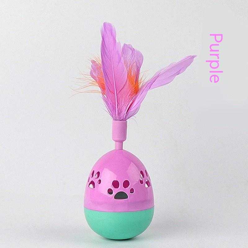 PetHaven.comTumbler Bell Cat Interactive ToysTumbler Bell Cat Interactive ToysProduct information:
 
 Color: pink, purple, green
 
 Material: Plastic
 
 Category: Pet Toys
 
 Name: hollow footprints with feathers Tumbler
 
 Material: ABS
 
 Co0