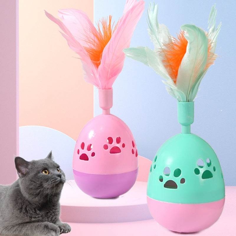 PetHaven.comTumbler Bell Cat Interactive ToysTumbler Bell Cat Interactive ToysProduct information:
 
 Color: pink, purple, green
 
 Material: Plastic
 
 Category: Pet Toys
 
 Name: hollow footprints with feathers Tumbler
 
 Material: ABS
 
 Co0