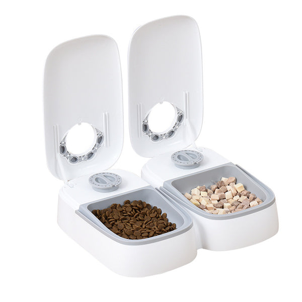 PetHaven.comPet Automatic Timing Feeder PuppyPet Automatic Timing Feeder PuppyProduct information:
 
 Material: Plastic
 
 Applicable object: Cat
 
 Specification: full double meal feeder/light gray
 
 Category: Pet tableware.
 
 Size: 242X2840