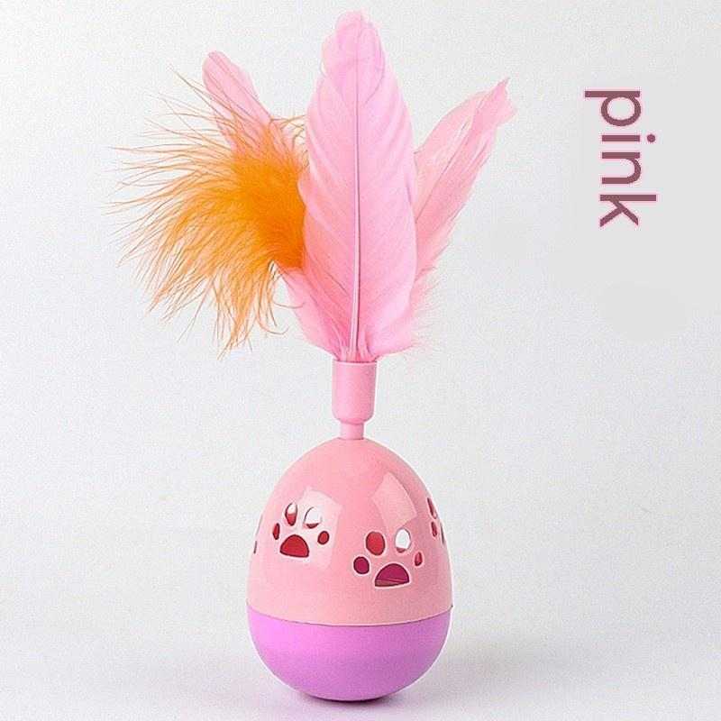 PetHaven.comTumbler Bell Cat Interactive ToysTumbler Bell Cat Interactive ToysProduct information:
 
 Color: pink, purple, green
 
 Material: Plastic
 
 Category: Pet Toys
 
 Name: hollow footprints with feathers Tumbler
 
 Material: ABS
 
 Co0